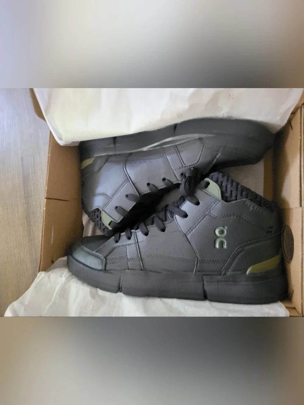 On Running Black High-Top Athletic Shoes with Olive Accents